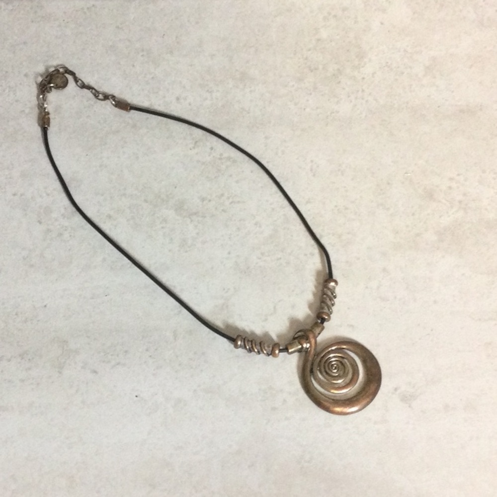 Axelle Creation copper swirl pendant on black cord necklace